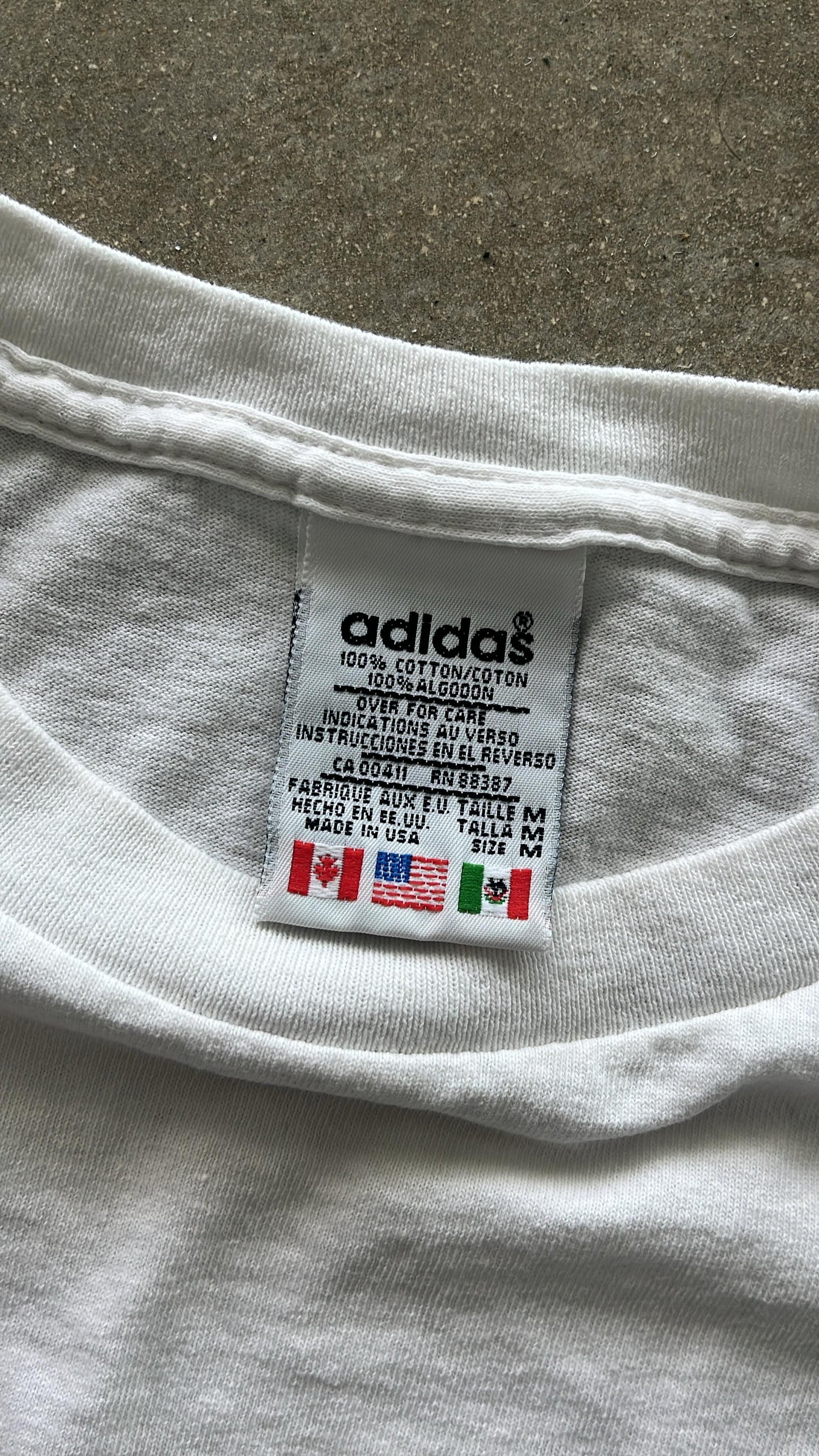 Vintage Adidas Bollettieri Sports Grille T-Shirt (circa 1990s) (cropped)